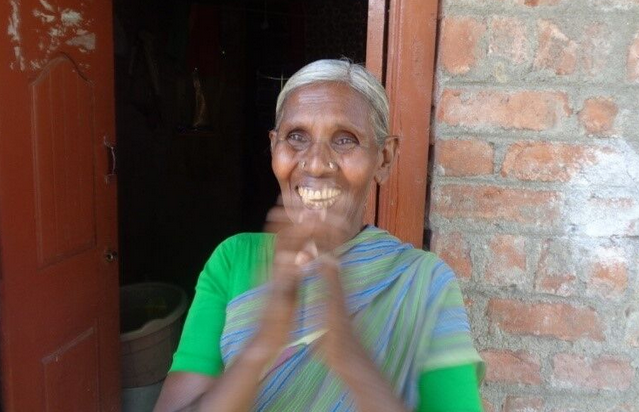 Woman from India claps happily after having her sight restored