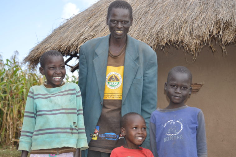 Kenyan man and his family|Kenyan brick maker has sight restored through Operation Eyesight|Kenyan brick-maker has sight restored