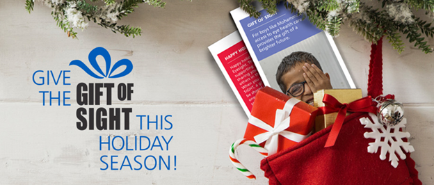 An image of Christmas gifts and gift tags with the text "Give the Gift of Sight This Holiday Season"|An image of Christmas gifts and gift tags with the text "Give the Gift of Sight This Holiday Season"|A family photo with members smiling at the camera|A family photo with members smiling at the camera